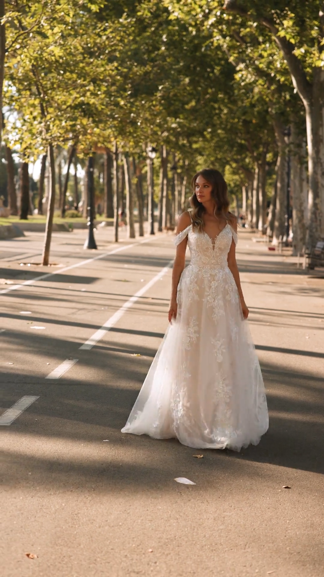 Style ALEXIS S2239 Sweetheart and Open Illusion Back Tulle with Embroidered Lace Appliques Full A-Line with Swag Sleeves Style ALEXIS S2239 Sweetheart and Open Illusion Back Tulle with Embroidered Lace Appliques Full A-Line with Swag Sleeves