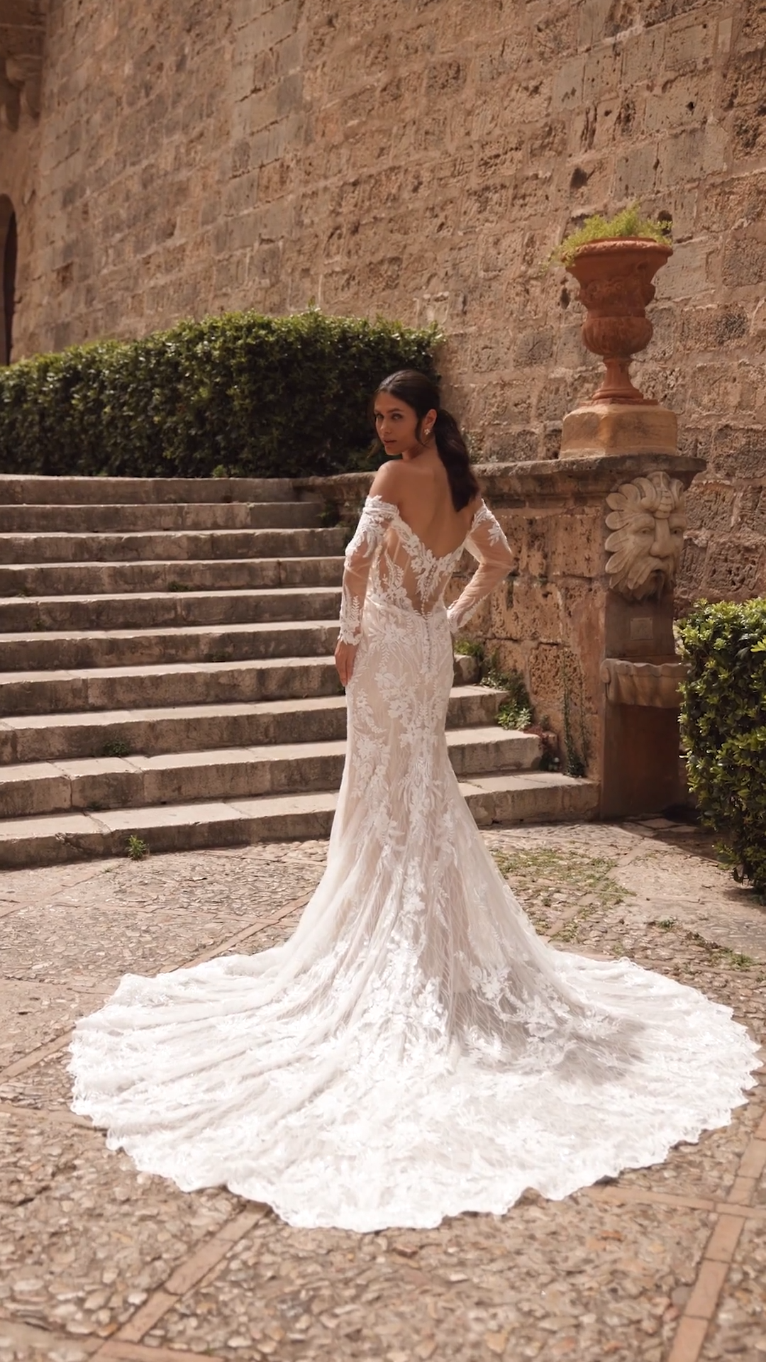 Sparkle and lace wedding dress with off the shoulder long sleeves and pointed leaf shaped train Sparkle and lace wedding dress with off the shoulder long sleeves and pointed leaf shaped train