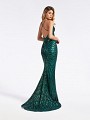 Green sequined cocktail dress with horsehair trim hem and natural waistline Green sequined cocktail dress with horsehair trim hem and natural waistline