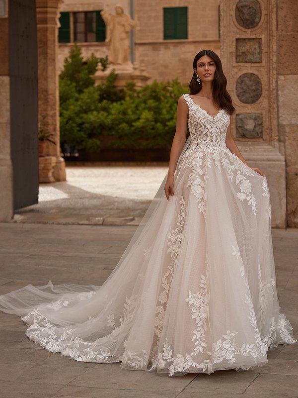 Full A-line 3D floral lace wedding dress with portrait neckline with dotted sparkle net