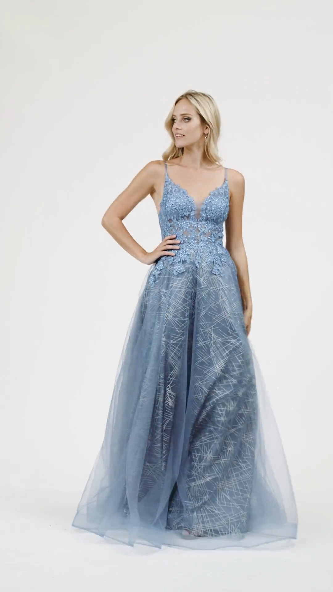 Val Stefani 3963RD floor length tulle over glitter print net A-line with unlined bodice and V-back and horsehair trim hem Val Stefani 3963RD floor length tulle over glitter print net A-line with unlined bodice and V-back and horsehair trim hem