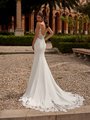 Bride wearing crepe mermaid wedding dress with lace cut out chapel train Bride wearing crepe mermaid wedding dress with lace cut out chapel train